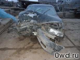 Битый автомобиль Nissan Laurel